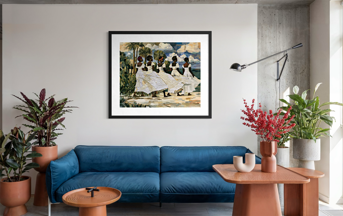 Framed fine art print depicting Afrocentric Gullah Geechee women dressed in white faux quilt-style pattern dresses celebrating Black Lowcountry coastal heritage, African American ancestry, cultural traditions, family, community, and life rooted by the sea.  Hanging on a light gray wall above a blue sofa in a modern living room setting.