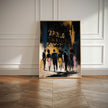 A framed vertical art print leaning against a white paneled wall on a wood floor. The artwork depicts silhouetted figures walking toward the Apollo Theatre in gold against a dark blue, black, and gold background.