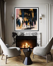 A framed abstract art print featuring the historic Apollo Theatre and silhouetted figures, displayed above a fireplace in a modern living room setting with two gray armchairs and a black side table.