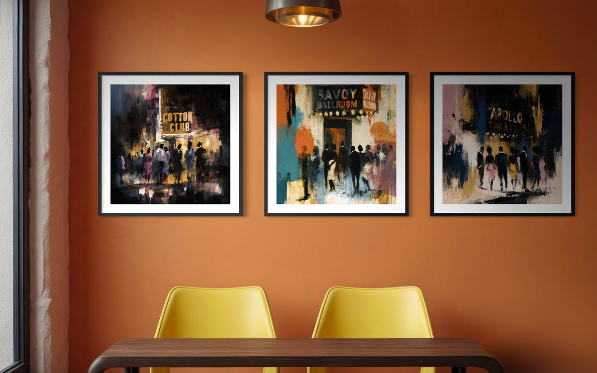 Set of 3 art prints featuring historic entertainment clubs: Harlem Cotton Club, Savoy Ballroom and the legendary Apollo Theatre.  The prints are displayed on an orange wall over a yellow chairs and wood desk.