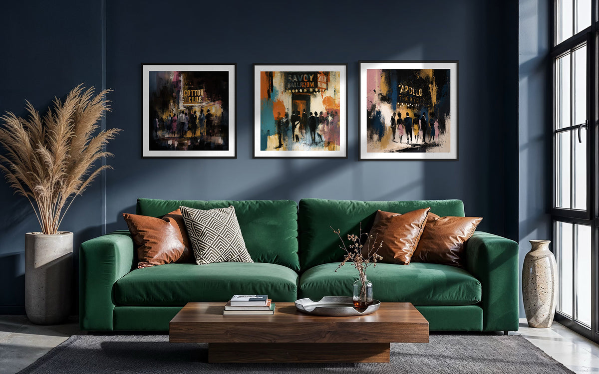 Set of 3 art prints featuring historic entertainment clubs: Harlem Cotton Club, Savoy Ballroom and the legendary Apollo Theatre.  The prints are displayed on a blue wall over a dark green sofa in a living room space.