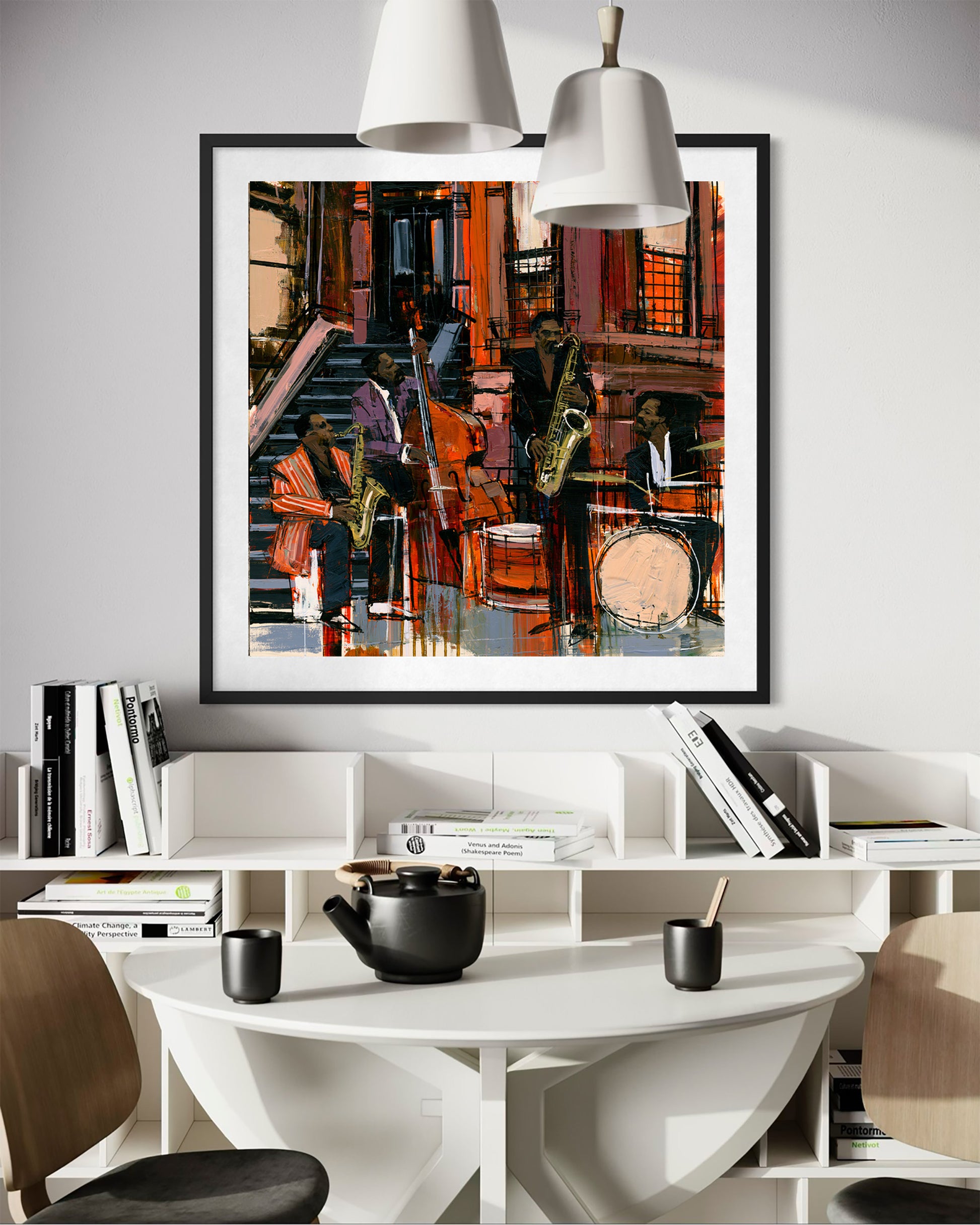 A framed art print depicting a jazz band performing on the sidewalk in from of Harlem's historic brownstones, styled in a modern office setting above a white table and shelves.