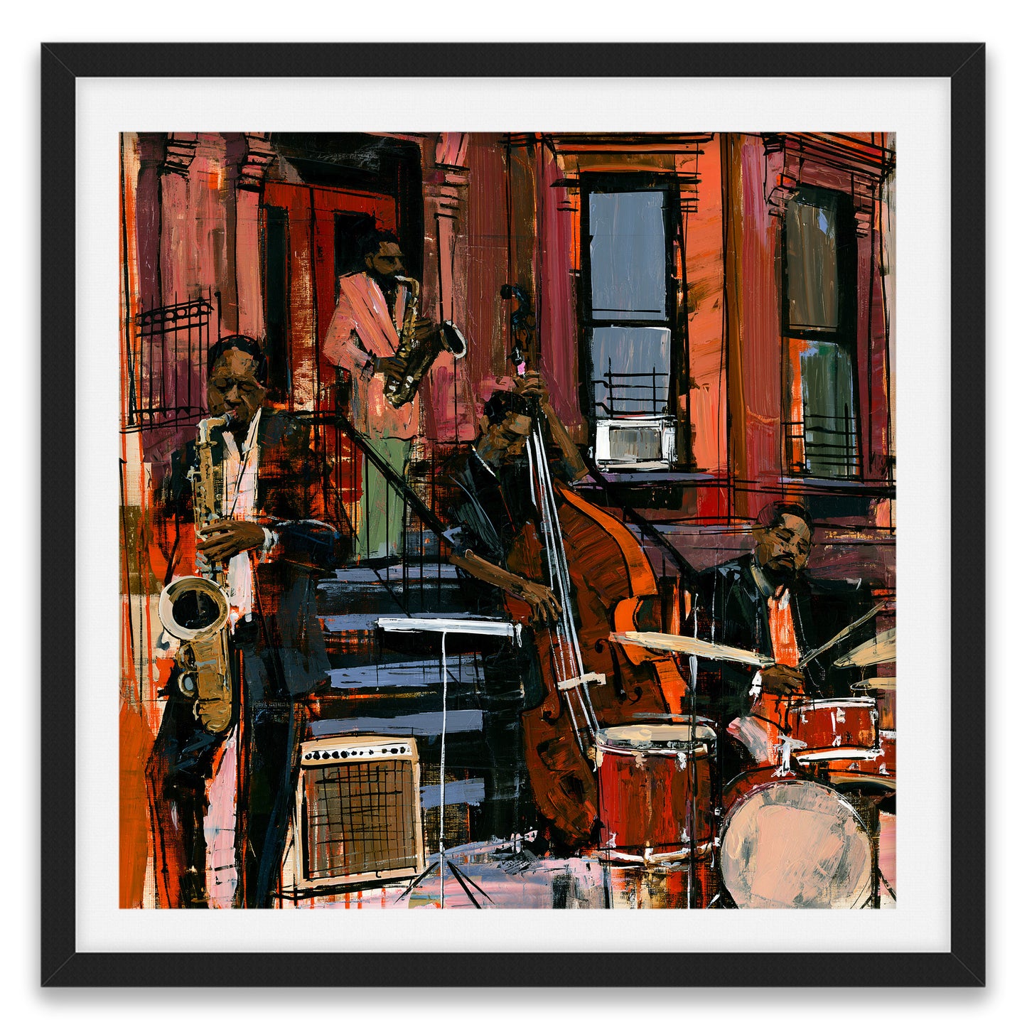 Framed wall art featuring an expressive, painterly jazz scene with musicians playing saxophone, double bass, and drums in front of a red-brown building. The artwork is shown with a white mat and a black frame on a light background.