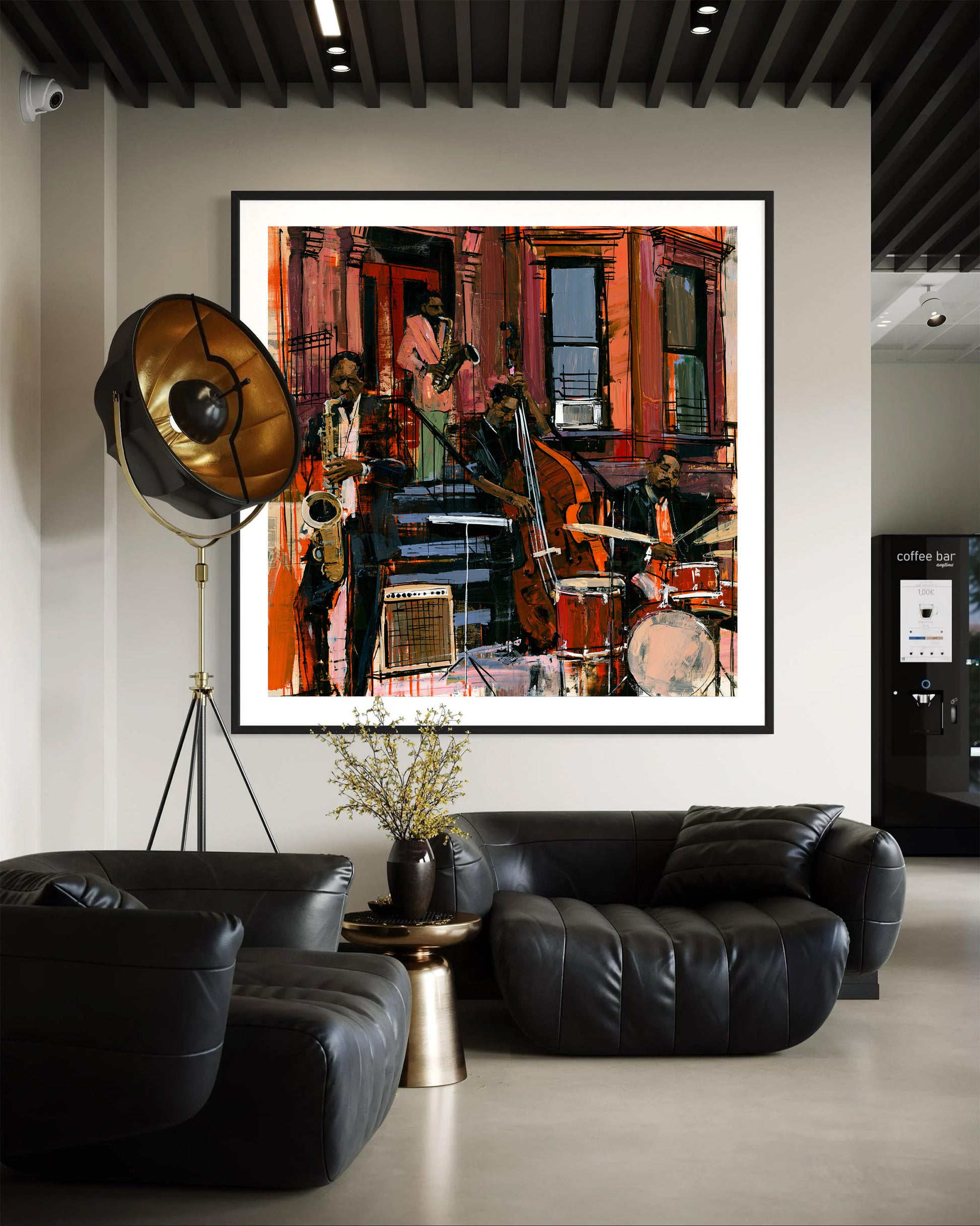A framed abstract jazz music painting hangs on a beige wall above a black leather sofa.  The artwork features jazz musicians playing on the sidewalk in front of Harlem's historic brownstone buildings.